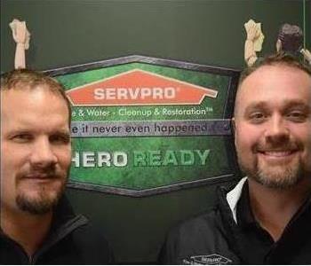 Two SERVPRO employees smiling
